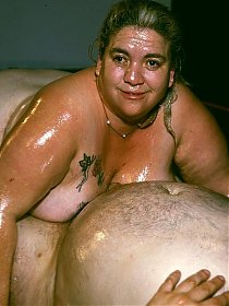 Naughty BBW covered in goo while a horny guy examines her big fat tits and enormous booty live