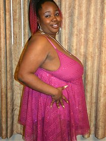 Ebony BBW model flaunts her big tits and taking a big black dick in her fat covered twat